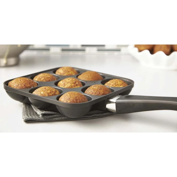 Shop a Nonstick Aebleskiver-Puff Dumpling Pan with Bakelite Handles